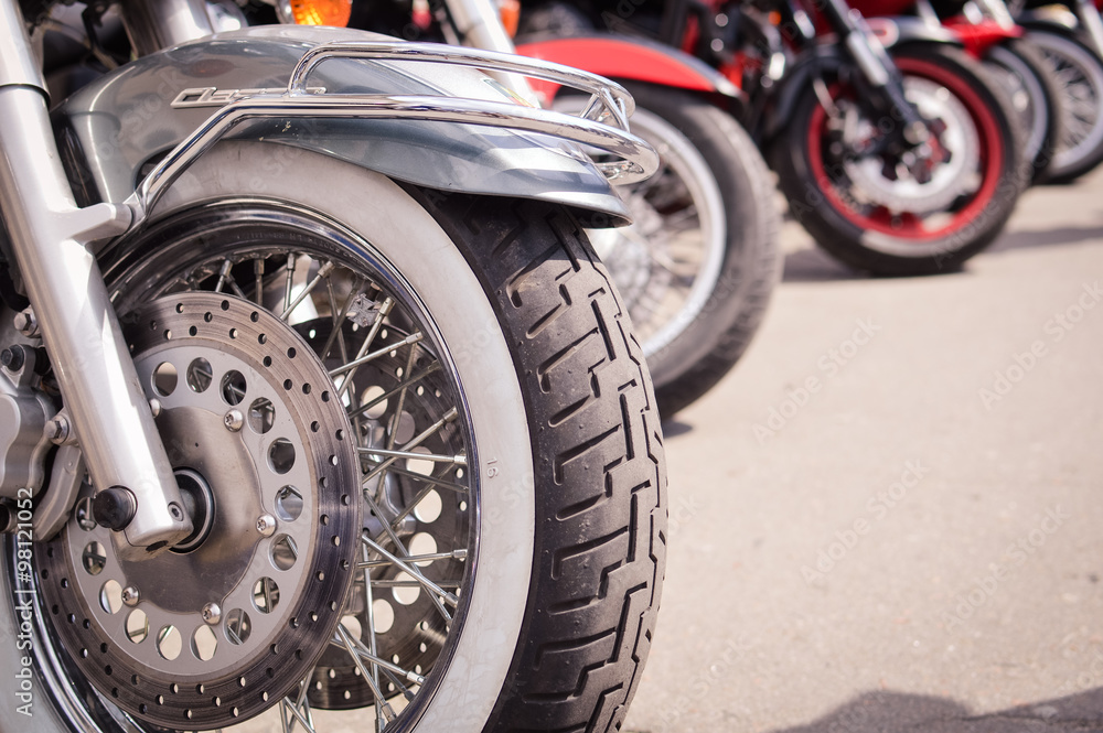 Group of motorbikes parked together Group of motorbikes parked together
