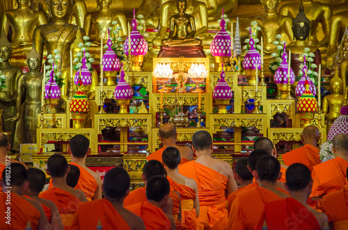 Buddhist Monks in meditation in a temple (Bangkok Thailand)