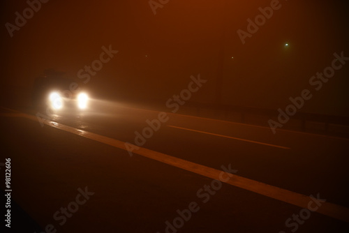Fototapeta Naklejka Na Ścianę i Meble -  Night scene on the road with fog