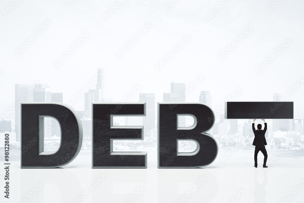 Debt concept with businessman and debt inscription at city backg Debt concept with businessman and debt inscription at city backg