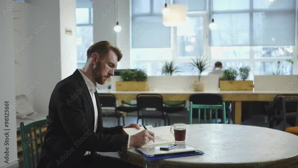 Man working and waiting for the meeting with the business partner Man working and waiting for the meeting with the business partner
