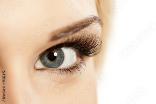 Obraz na plátně closeup of made-up female eye with artificial eyelashes