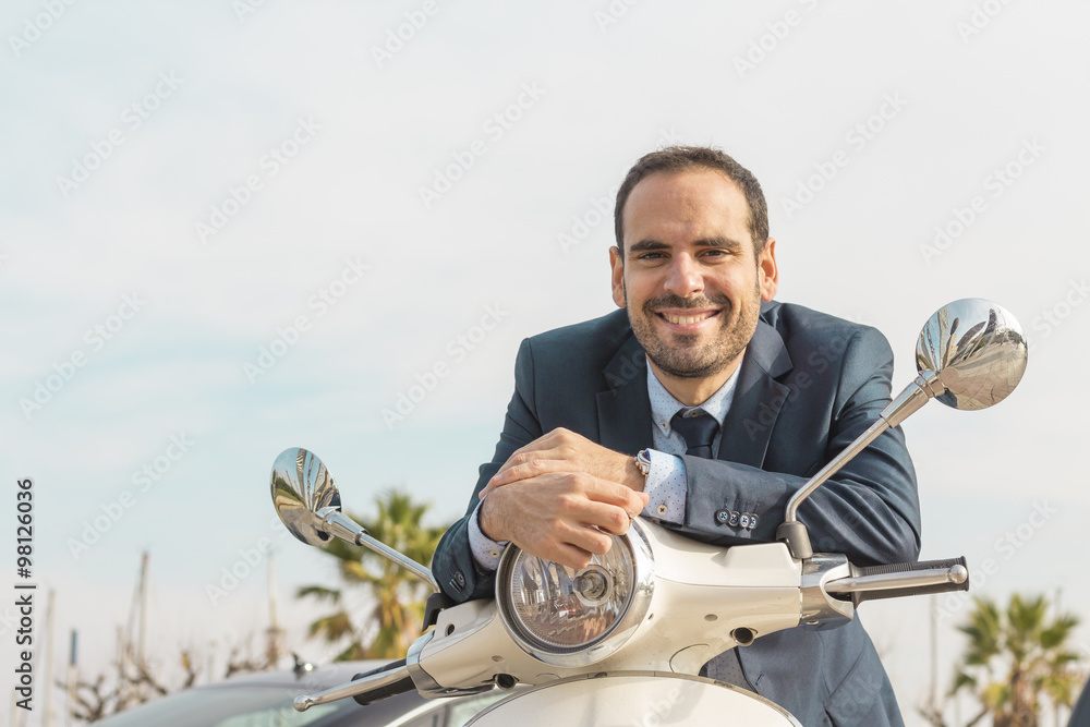Business man with his scooter