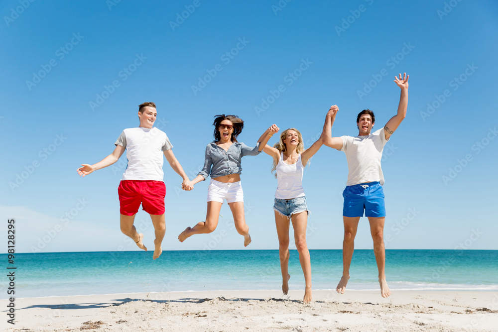 Company of young people on the beach Company of young people on the beach