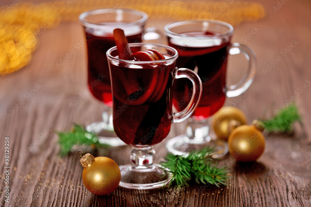 Mulled wine on wooden table Mulled wine on wooden table