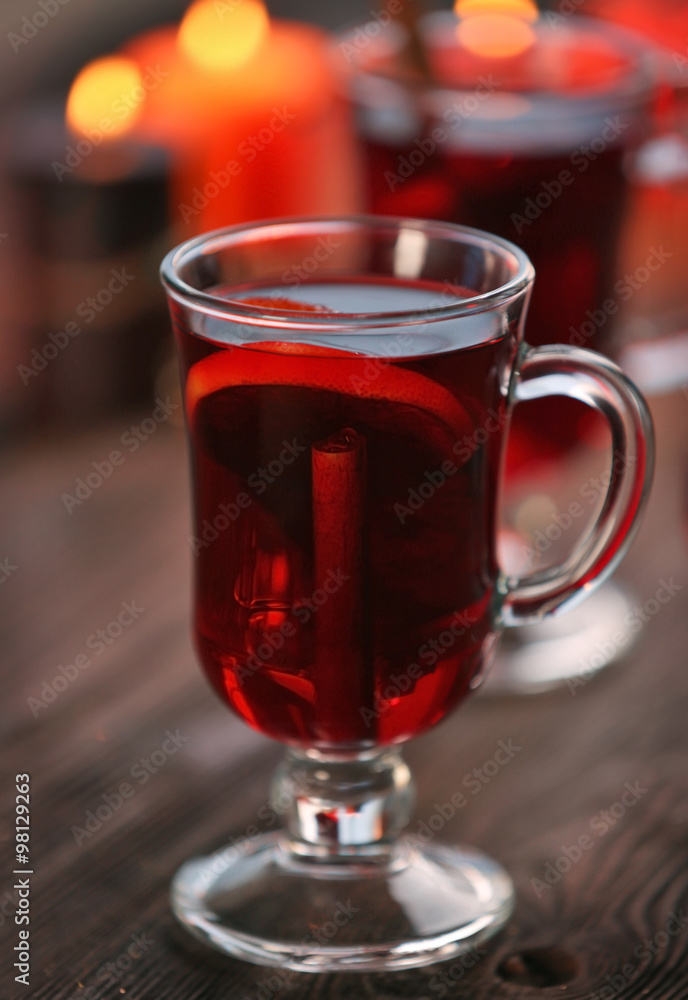 Mulled wine on wooden table, close-up Mulled wine on wooden table, close-up