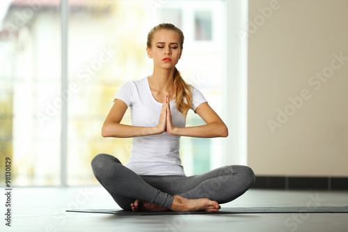 Fototapeta Naklejka Na Ścianę i Meble -  Young woman do yoga - meditation