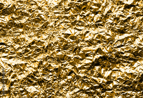 Crumpled Aluminum Foil Background Texture - in Gold Color 