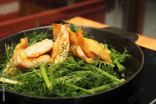 Vietnamese grilled turmeric fish with dill, Cha ca La vong, popular in Hanoi.