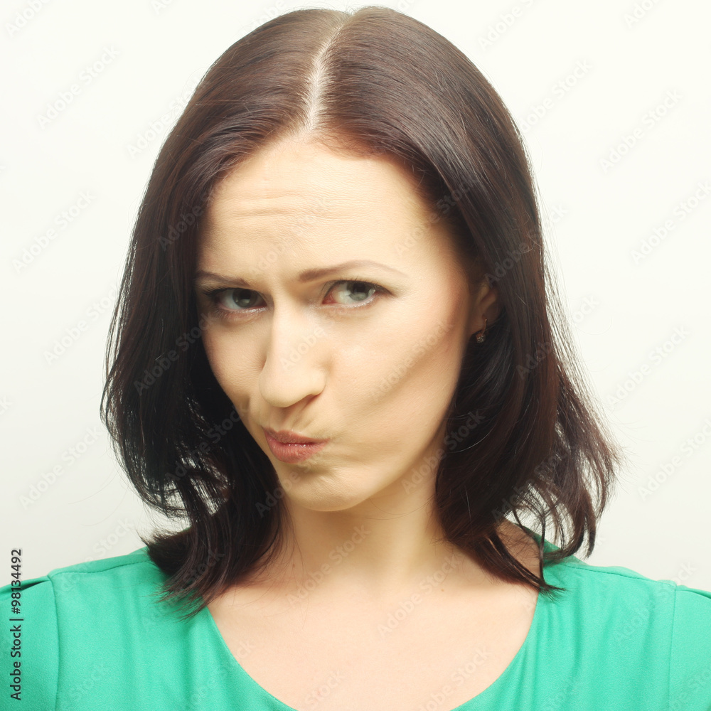 Fototapeta premium Thinking woman. Studio shot.