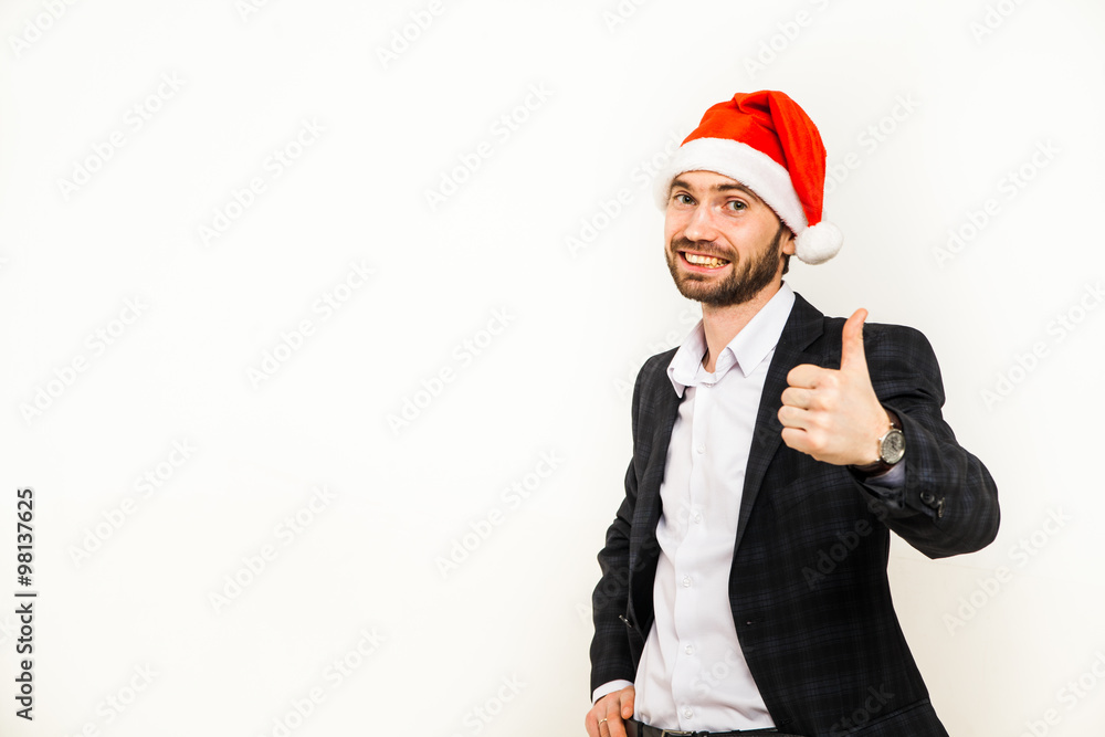 Businessman in suit with santa hat on head. Isolated over white background Businessman in suit with santa hat on head. Isolated over white background