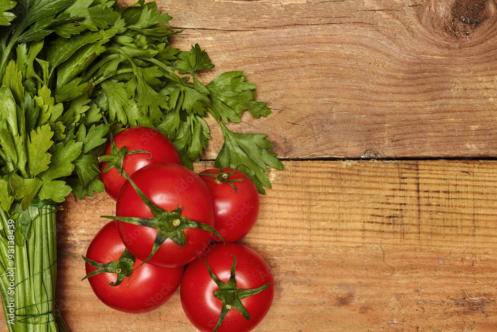 parsley, dill and tomatoes on wooden background parsley, dill and tomatoes on wooden background