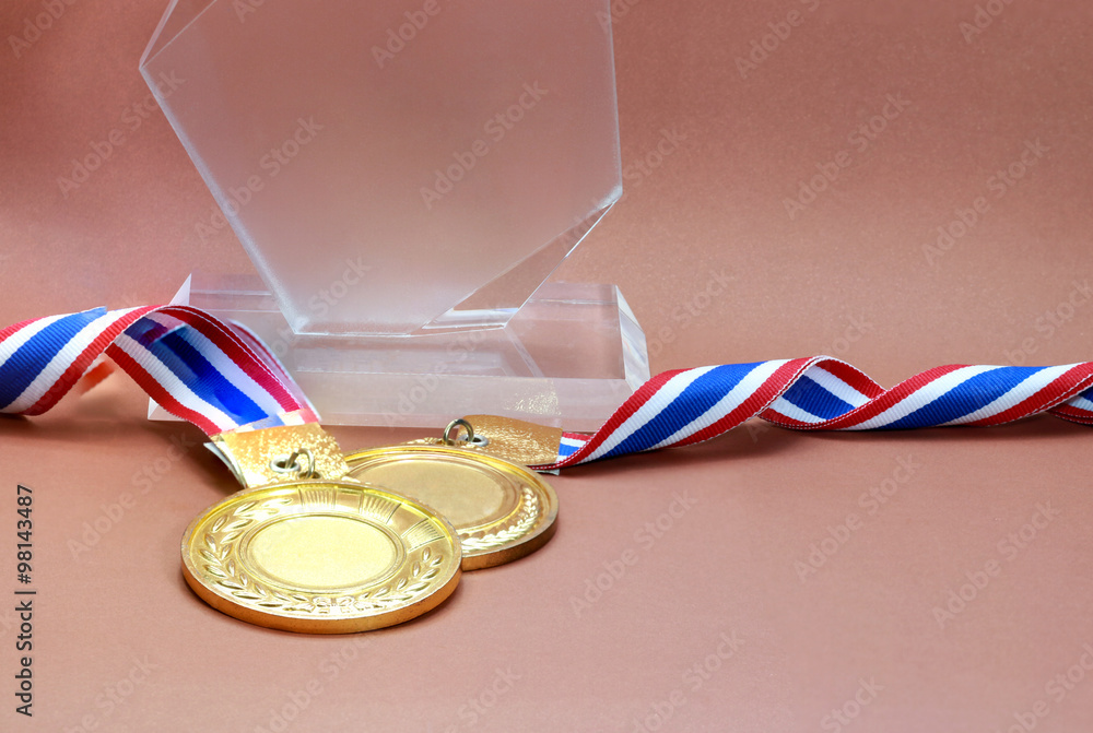 gold medal and trophy indoor to show for win : concept to the winner gold medal and trophy indoor to show for win : concept to the winner
