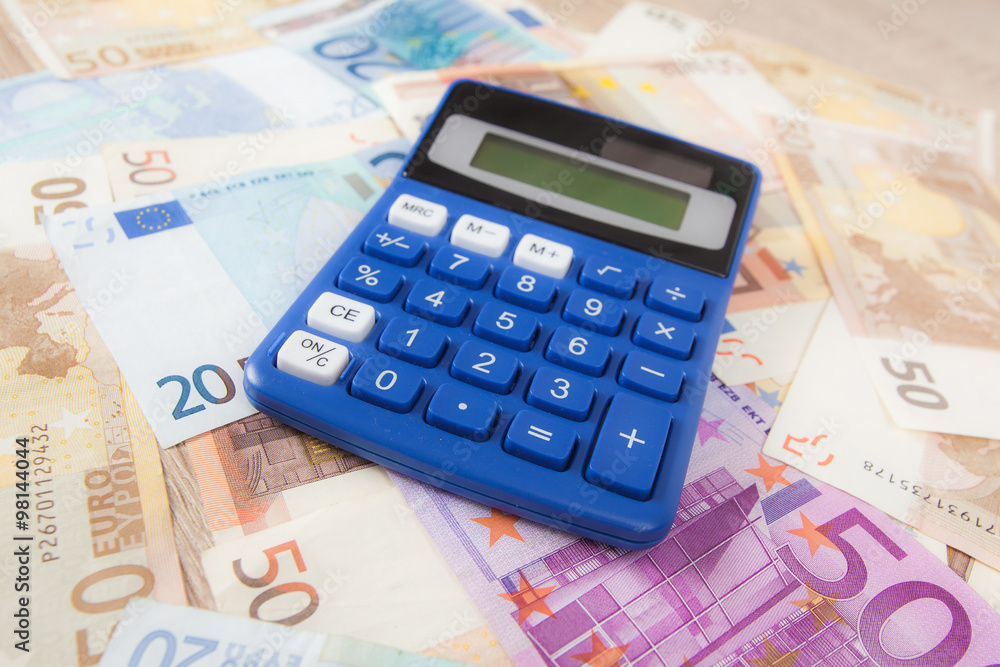 Calculator with Euro notes. Budget Concept. Money and calculat Calculator with Euro notes. Budget Concept. Money and calculat