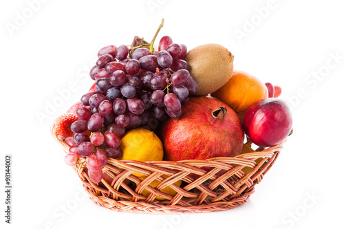 Fruits  in the basket. assorted fruits in wicker basket