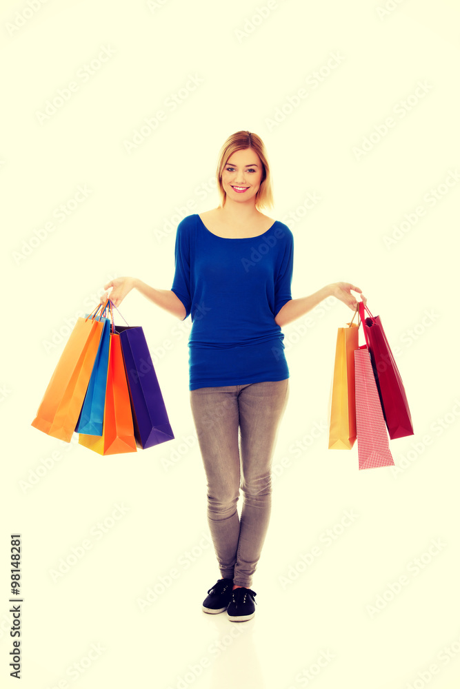 Woman with a lot of shopping bags. Woman with a lot of shopping bags.
