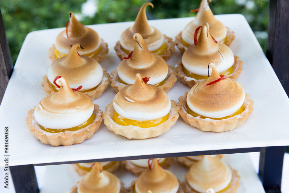 Creme mango tartlet with whipped cream Creme mango tartlet with whipped cream