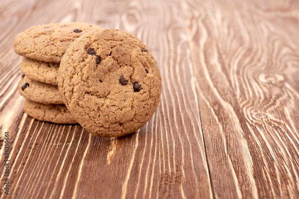 oat cookies on wooden table oat cookies on wooden table