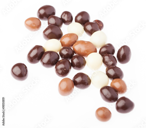 variety small chocolate balls isolated on a white background