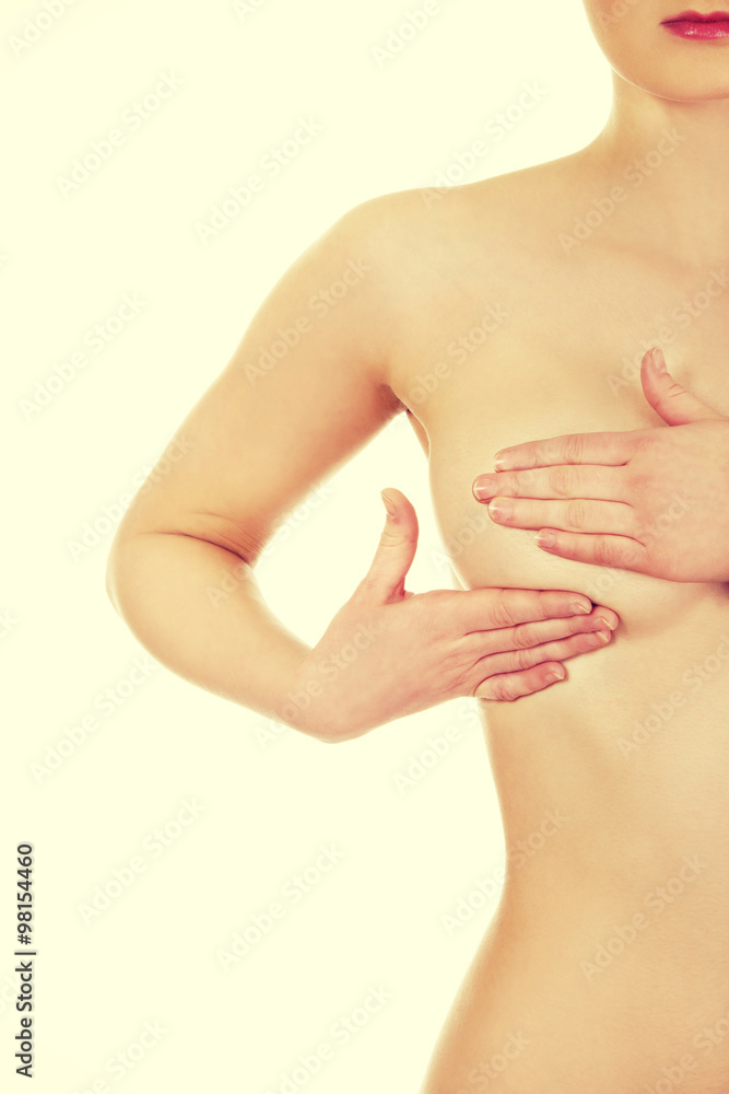 Fototapeta premium Woman examining breast.
