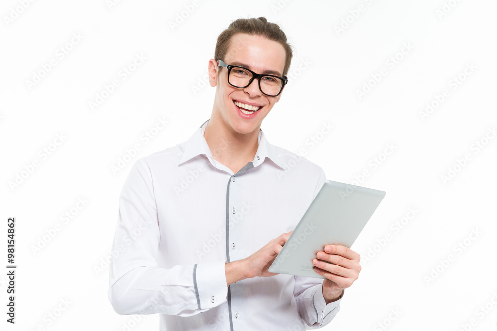 Cheerful businessman using tablet computer Cheerful businessman using tablet computer