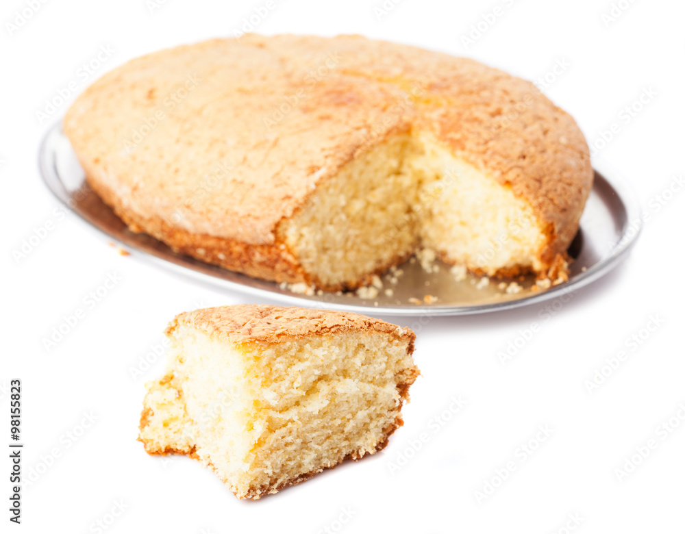 one piece of sponge cake isolated on a white background