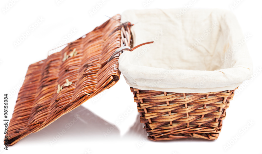 Obraz premium wicker basket isolated on a white background