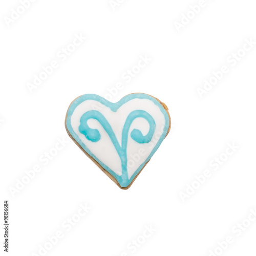 Homemade gingerbread cookie with colored frosting isolated on a