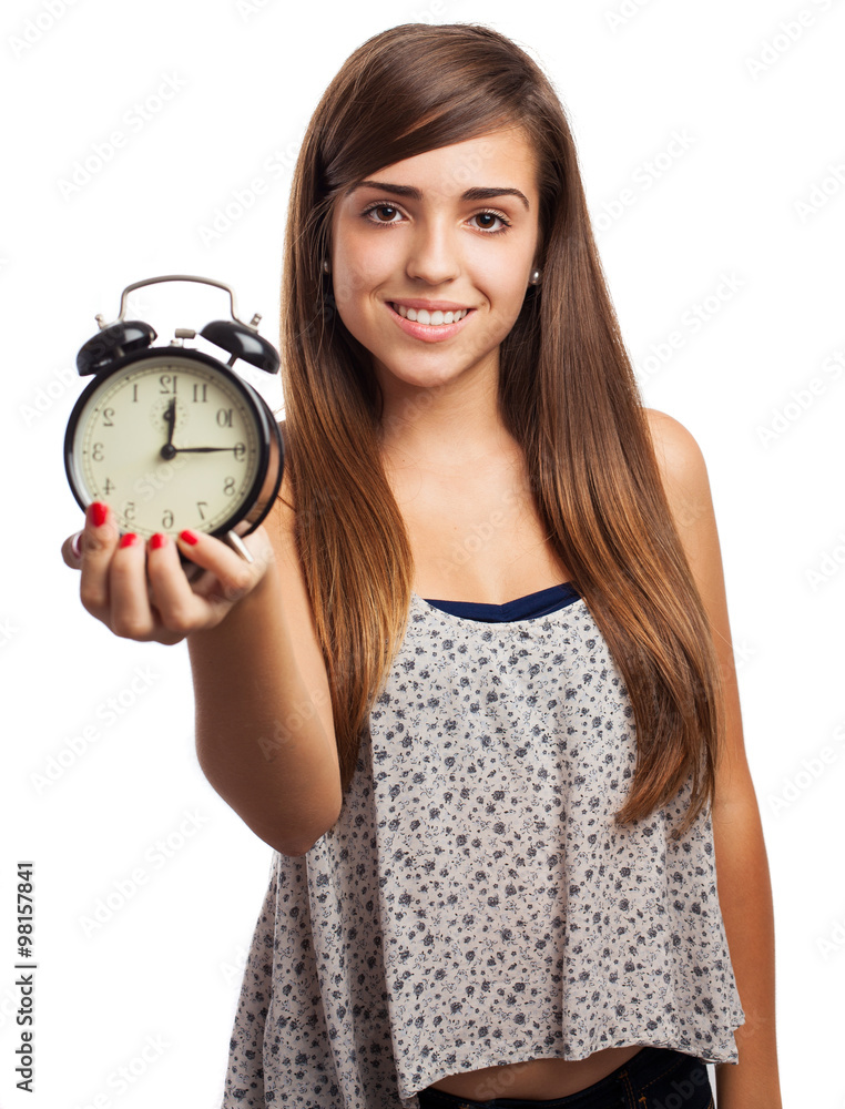portrait of young woman holding an alarm clock isolated on white portrait of young woman holding an alarm clock isolated on white