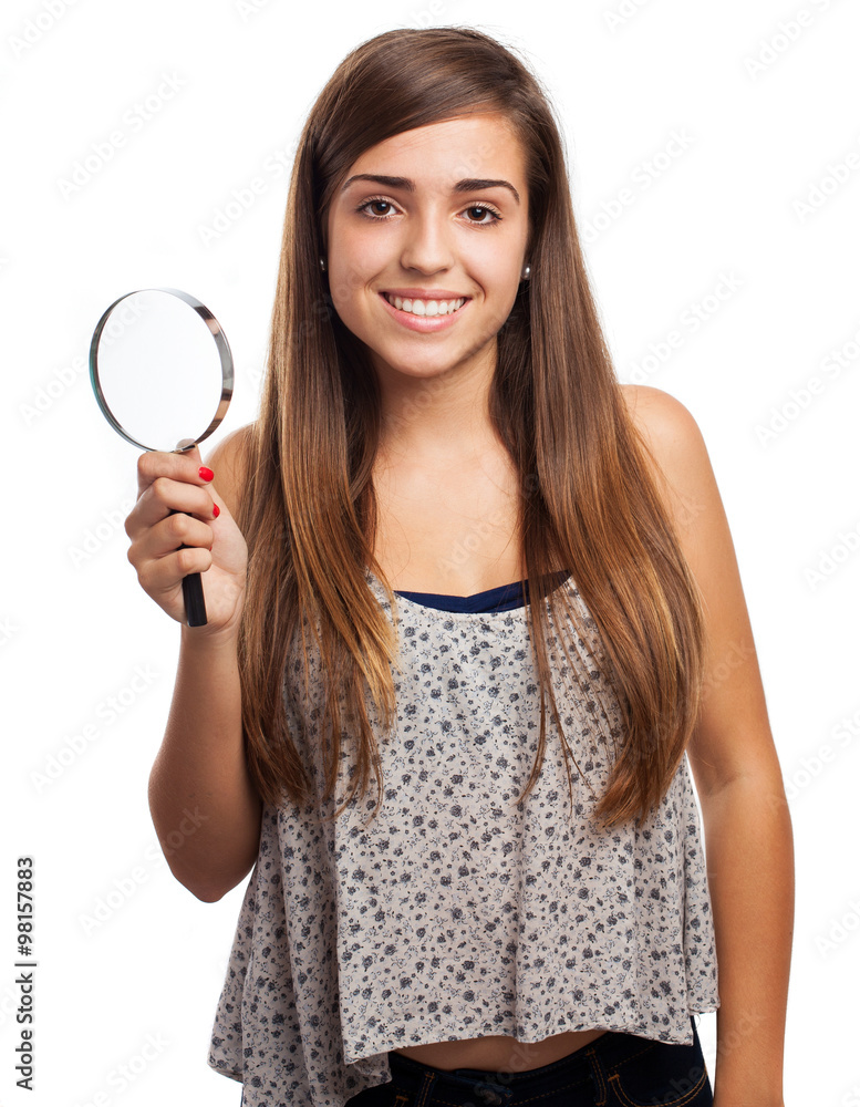 young woman holding a magnifying glass isolated on white young woman holding a magnifying glass isolated on white