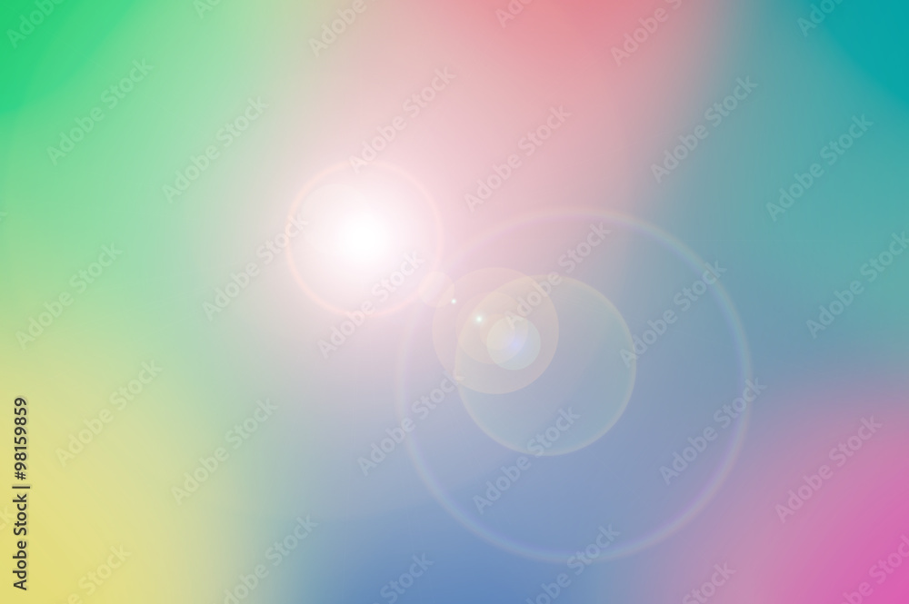 Colorful psychedelic background texture with a lens flare added