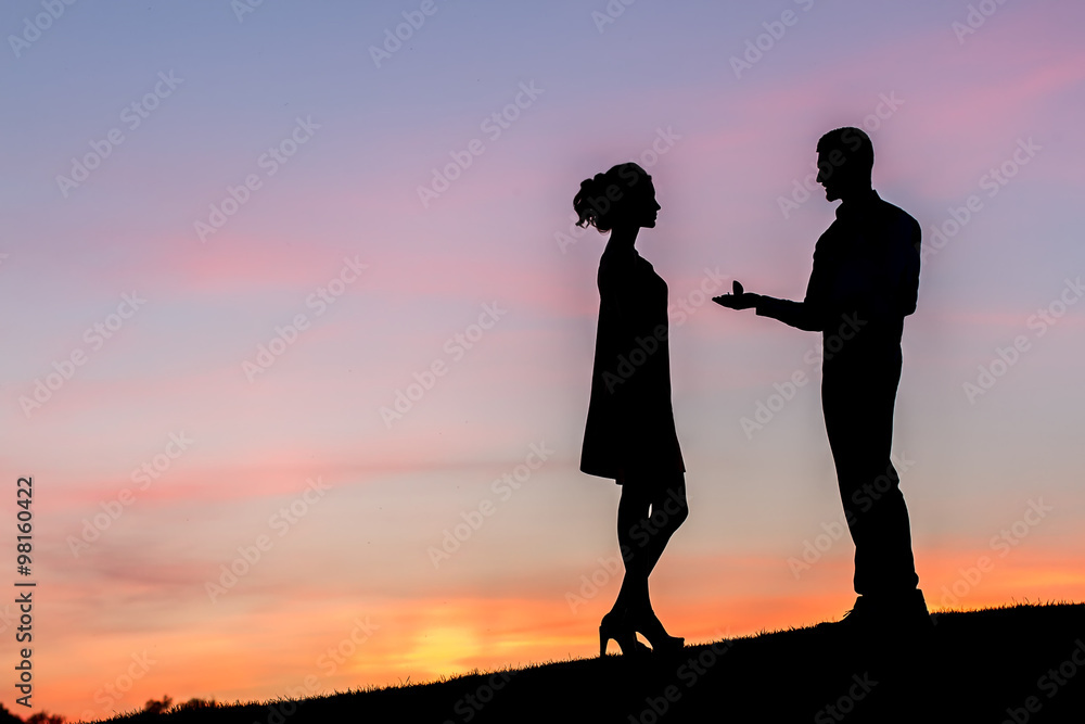 Guy doing the proposal for girl against a beautiful sky. Guy doing the proposal for girl against a beautiful sky.