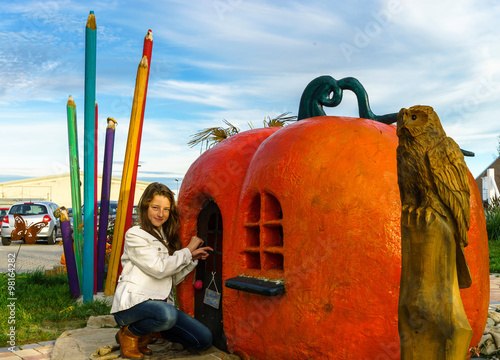 Teenage girl on children playground photo