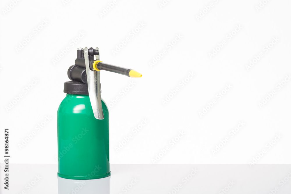 Naklejka premium green oil can on white background