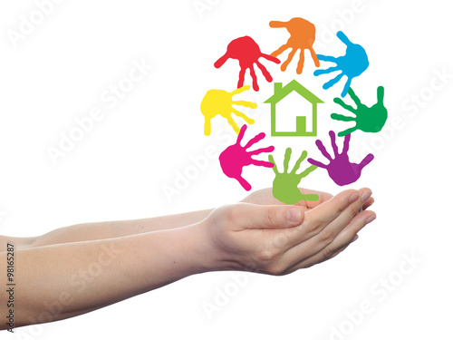 Concept circle of hands, green house symbol