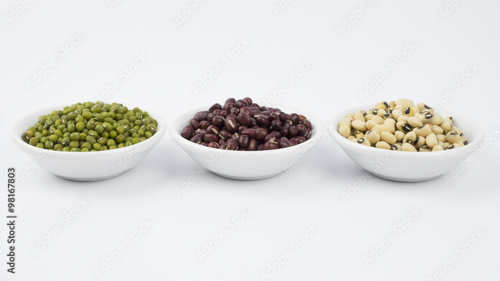 Black eye peas, mung bean and adzuki beans in white bowl on white background Black eye peas, mung bean and adzuki beans in white bowl on white background