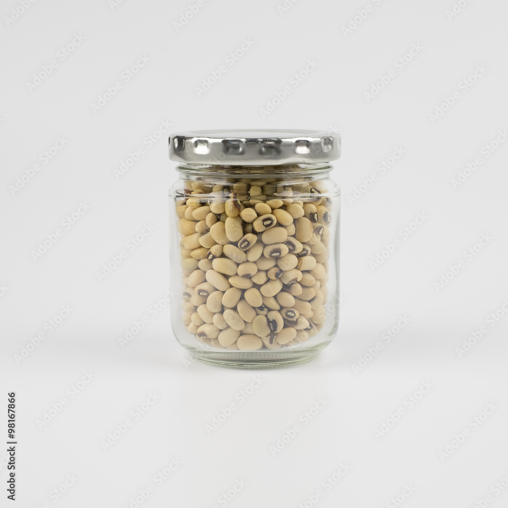 Black eye peas beans in a mason jar over white background Black eye peas beans in a mason jar over white background
