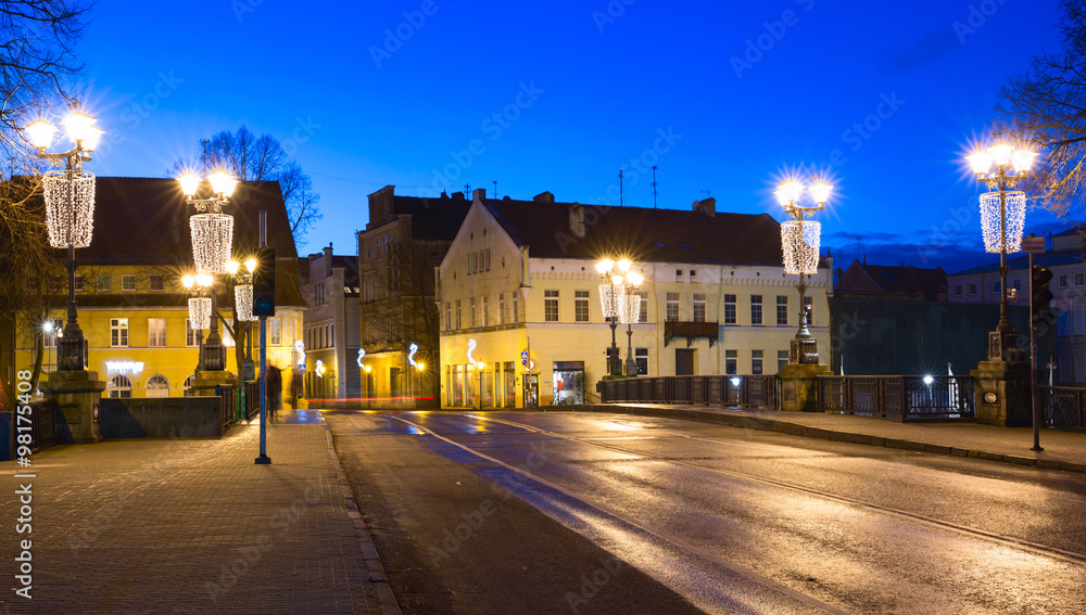Illuminated bridge in the Old town of Klaipeda city, Lithuania.