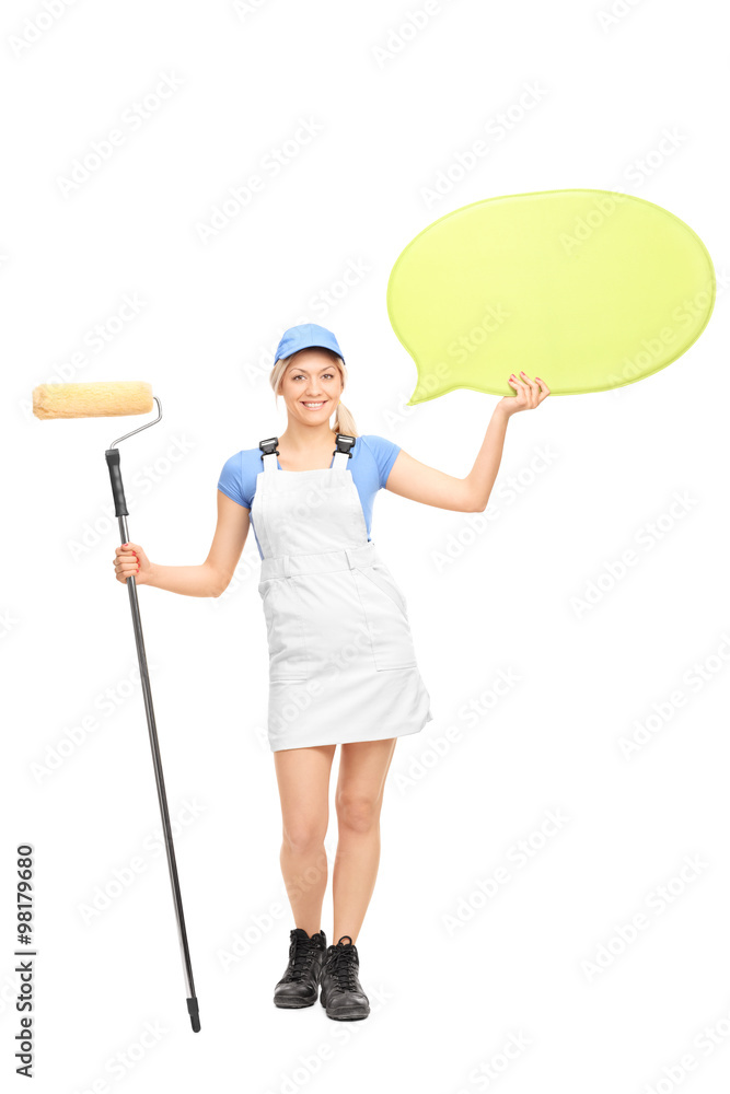 Female painter holding a speech bubble Female painter holding a speech bubble