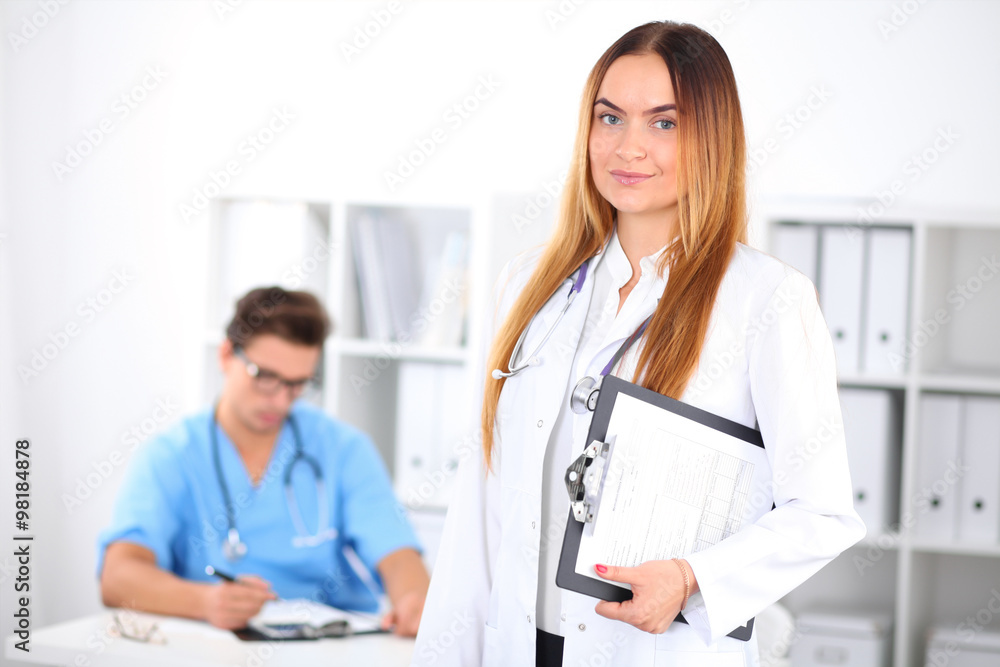 Beautiful smiling female doctor l Beautiful smiling female doctor l
