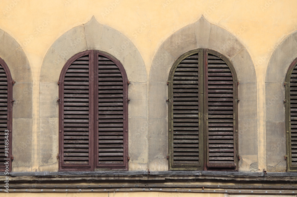 Fototapeta premium Arched windows in Florence, Italy