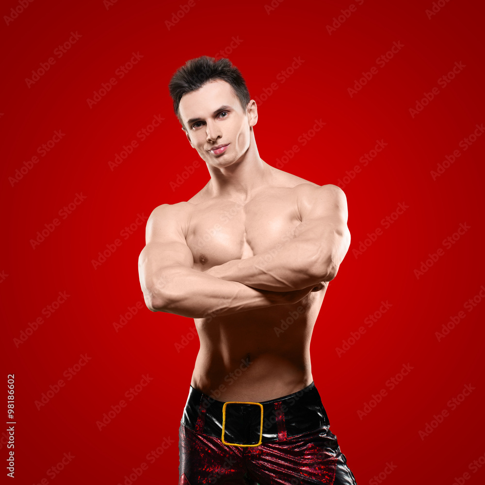 Fototapeta premium Muscular handsome sexy Santa Claus