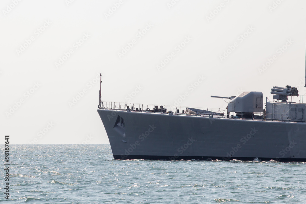 modern military ship sailing in the sea