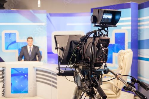 tv studio camera recording male reporter or anchorman. Live broadcasting