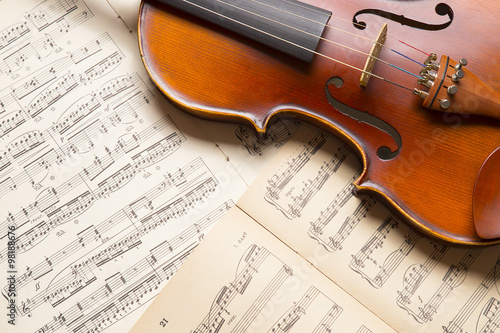 Fotografia, Obraz Vintage violin on the  sheet music.