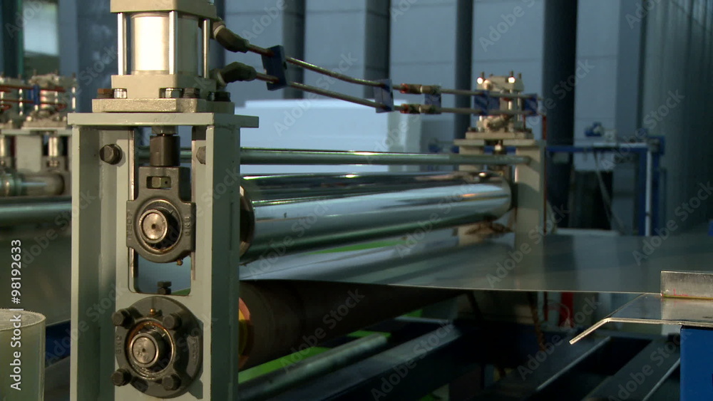Production material passes from machine's reel Production material passes from machine's reel