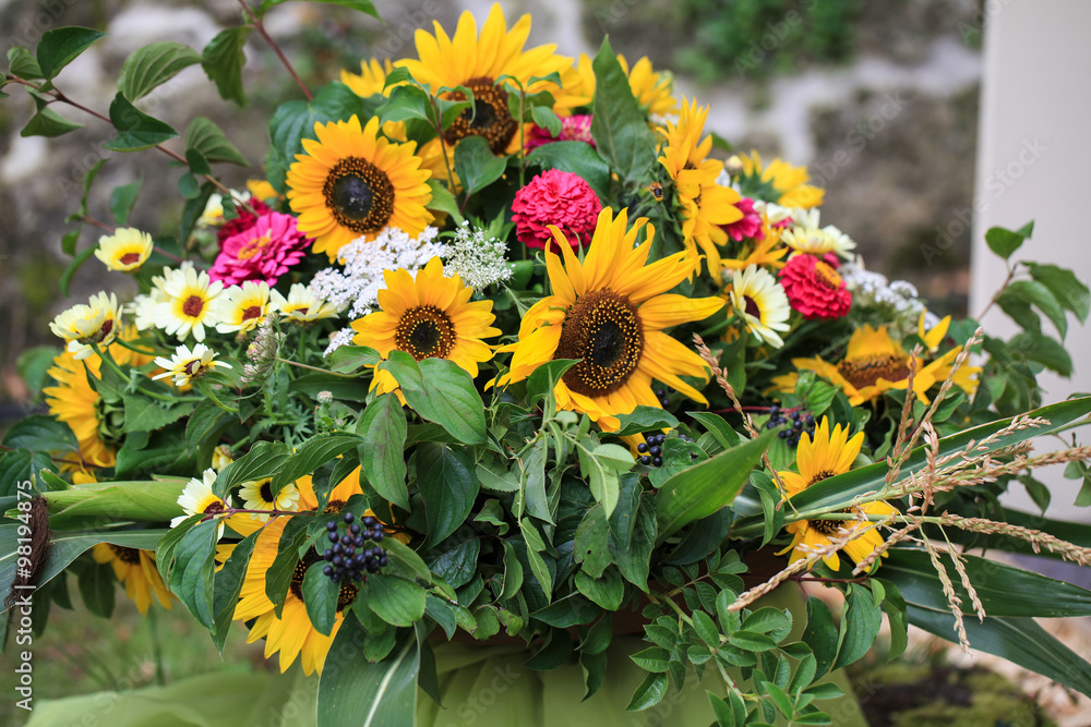 Fototapeta premium Colorful autumnal flower bouquet with sunflowers