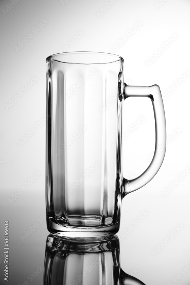 Empty pint of beer on a light background Empty pint of beer on a light background