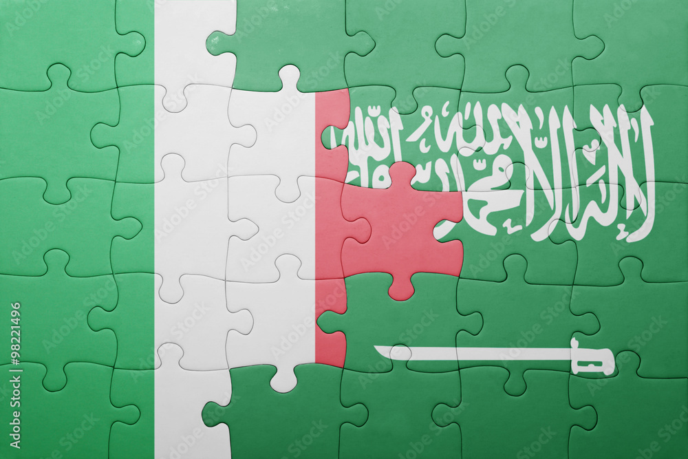 Fototapeta premium puzzle with the national flag of saudi arabia and italy