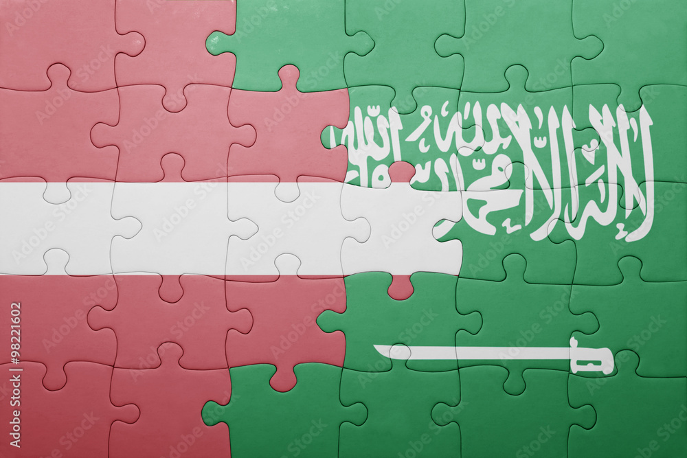 Fototapeta premium puzzle with the national flag of saudi arabia and latvia
